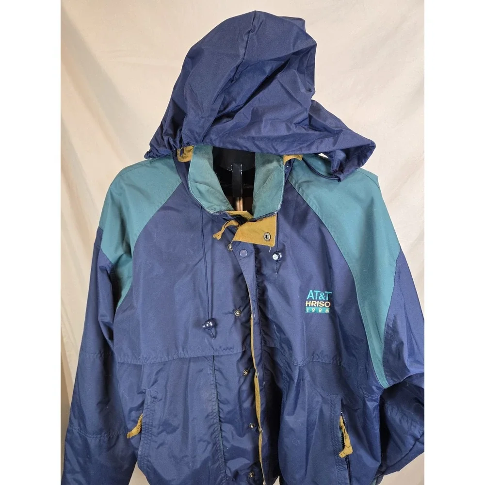 vintage 1996 AT&T Hriso nylon windbreaker jacket in a navy blue and teal...